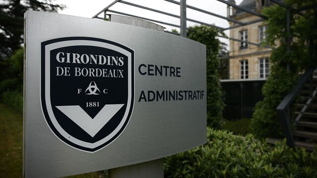 This general view taken on May 19, 2022, shows a sign with a logo in front of the chateau of FC Girondins de Bordeaux at the club's training ground in Le Haillan, near Bordeaux, south-western France.