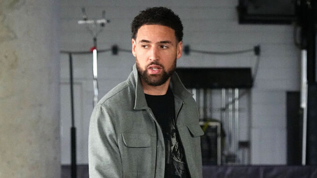 DALLAS, TX - MARCH 13: Klay Thompson #11 of the Golden State Warriors arrives to the arena before the game against the Dallas Mavericks on March 13, 2024 at the American Airlines Center in Dallas, Texas. Mandatory Copyright Notice: Copyright 2024 NBAE