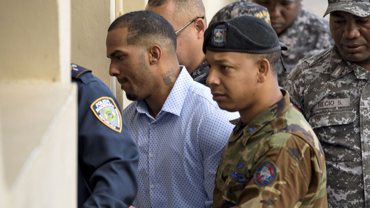 Tampa Bay Rays Dominican baseball shortstop Wander Franco (L), who faces an accusation of molesting an underage girl, arrives in court under heavy escort in Puerto Plata, in Dominican Republic, on January 5, 2024. The hearing was being held behind closed doors and Franco, 22, who is eligible for the Major League Baseball All-Star Game in the 2023 season, did not make a statement before entering. The baseball player and the mother of the 15-year-old girl were charged with "the crimes of commercial sexual exploitation and money laundering."