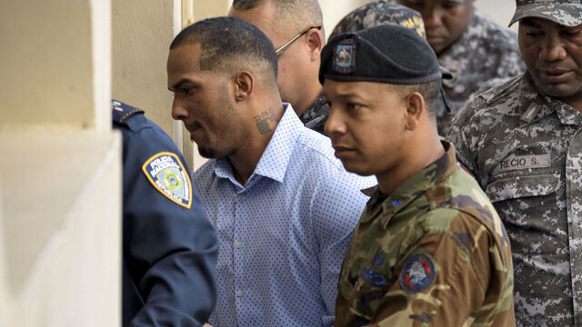Tampa Bay Rays Dominican baseball shortstop Wander Franco (L), who faces an accusation of molesting an underage girl, arrives in court under heavy escort in Puerto Plata, in Dominican Republic, on January 5, 2024. The hearing was being held behind closed doors and Franco, 22, who is eligible for the Major League Baseball All-Star Game in the 2023 season, did not make a statement before entering. The baseball player and the mother of the 15-year-old girl were charged with "the crimes of commercial sexual exploitation and money laundering."