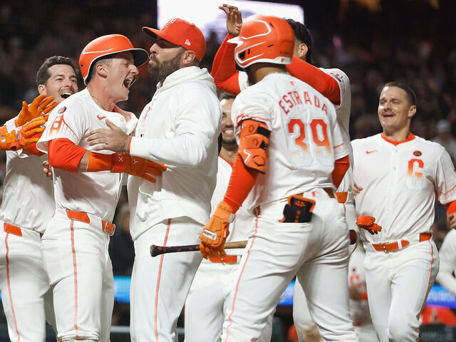 SAN FRANCISCO, CALIFORNIA - JULY 09: Tyler Fitzgerald #49 of the San Francisco Giants celebrates with teammates after scoring a walk-off run on a wild pitch by Trevor Richards of the Toronto Blue Jays in the bottom of the ninth inning at Oracle Park on July 09, 2024 in San Francisco, California.