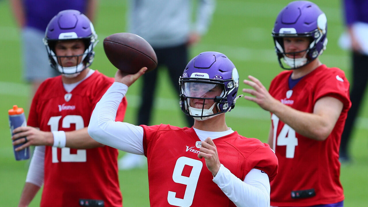 EAGAN, MINNESOTA - JUNE 04: Quarterbacks J.J. McCarthy #9, Sam Darnold #14 and Nick Mullens #12 of the Minnesota Vikings watch the drill during Minnesota Vikings mandatory minicamp at Twin Cities Orthopedics Performance Center on June 04, 2024 in Eagan, Minnesota.