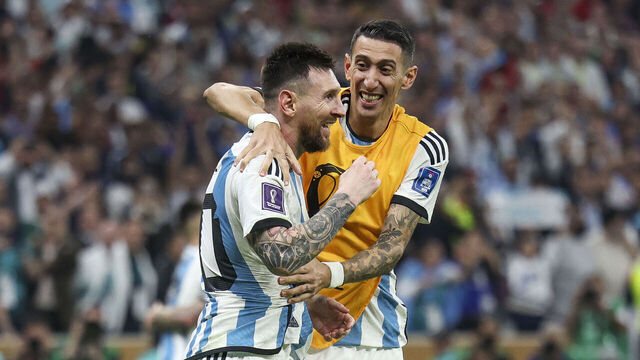 LUSAIL CITY, QATAR - DECEMBER 18: Lionel Messi of Argentina celebrates with Angel Di Maria after scoring their team's third goal p during the FIFA World Cup Qatar 2022 Final match between Argentina and France at Lusail Stadium on December 18, 2022 in Lusail City, Qatar.