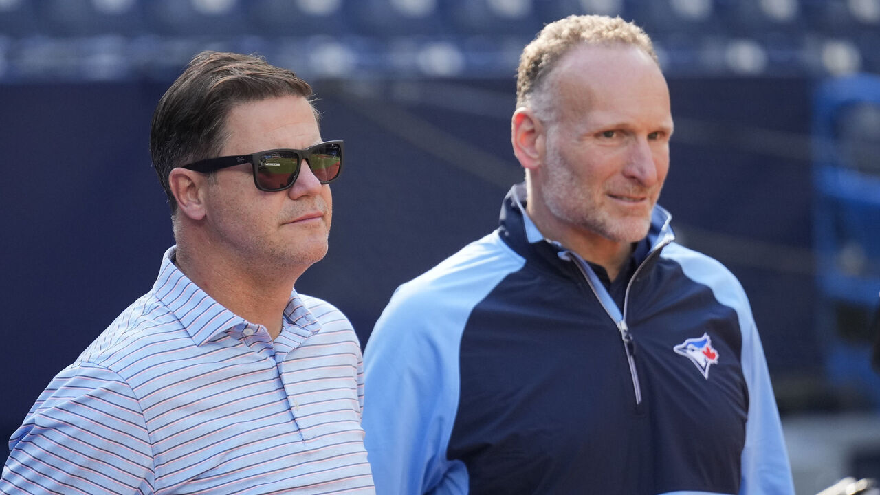 TORONTO, ON - APRIL 13: President and CEO of the Toronto Blue Jays Mark Shapiro and General Manager Ross Atkins speak during batting practice before their team plays the Detroit Tigers in their MLB game at the Rogers Centre on April 13, 2023 in Toronto, Ontario, Canada.