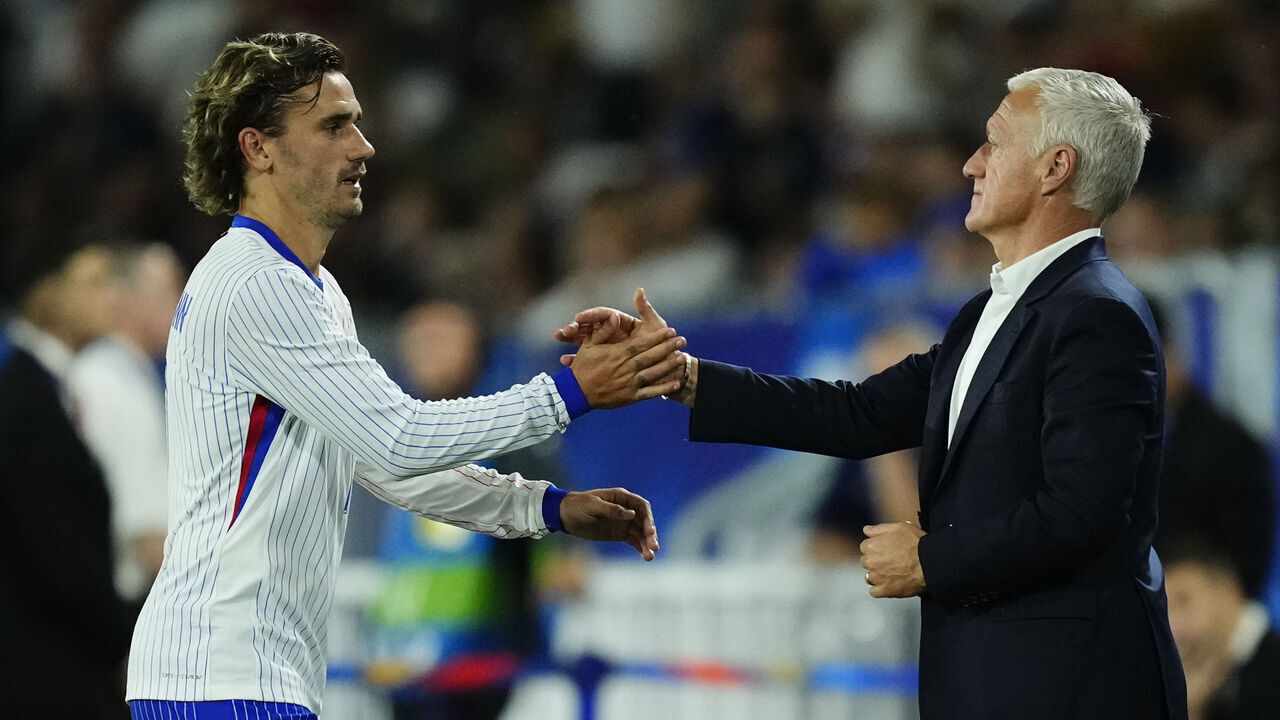 Antoine Griezmann centre-forward of France and Atletico de Madrid and Didier Deschamps head coach of France greets each other during the friendly match between France and Canada at Nouveau Stade Bordeaux on June 9, 2024 in Bordeaux, France.