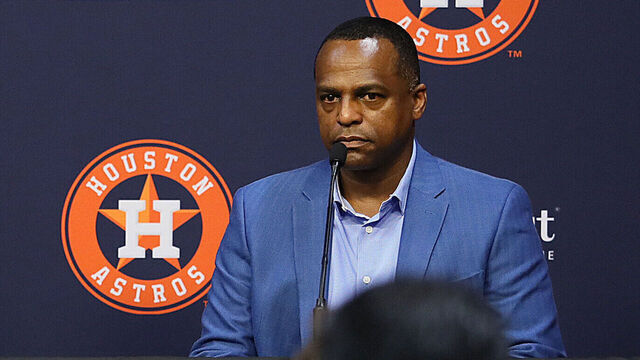 HOUSTON, TEXAS - OCTOBER 26: (L-R) Owner and Chairman Jim Crane of the Houston Astros, Dusty Baker Jr and general manager Dana Brown at a press conference as Baker announced his retirement as manager from the Houston Astro at Minute Maid Park on October 26, 2023 in Houston, Texas.
