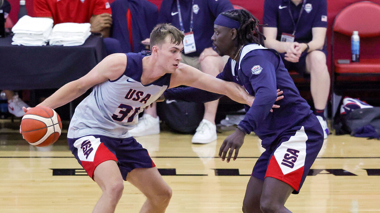LAS VEGAS, NEVADA - JULY 08: Cooper Flagg #31 of the 2024 USA Basketball Men's Select Team is guarded by Jrue Holiday #12 of the 2024 USA Basketball Men's National Team during a practice session scrimmage at the team's training camp at the Mendenhall Center at UNLV on July 08, 2024 in Las Vegas, Nevada.