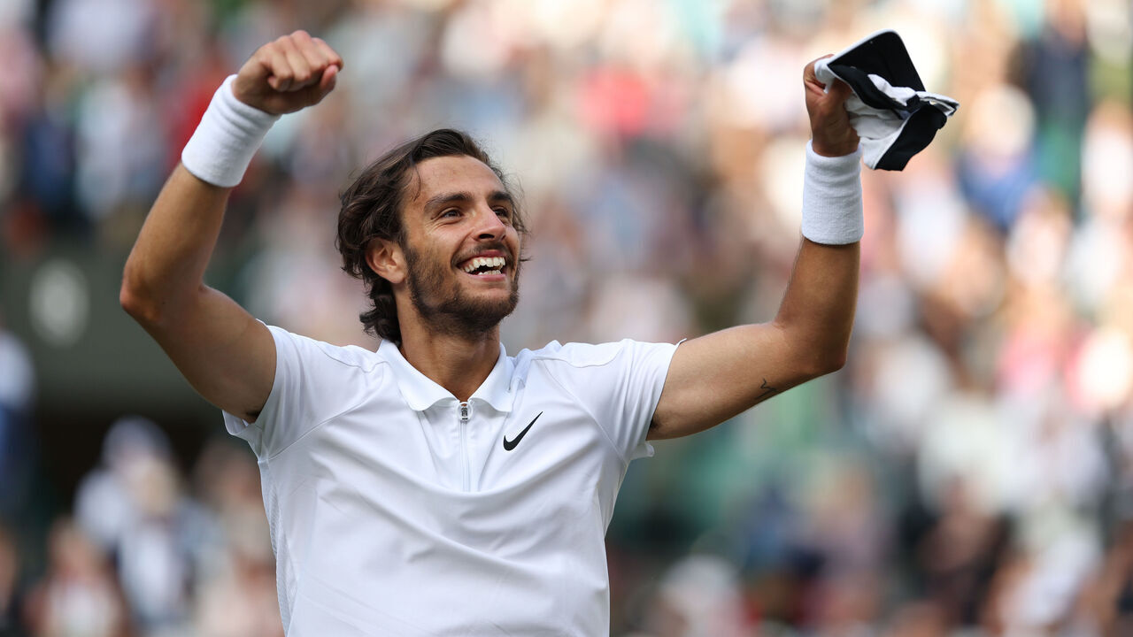 LONDON, ENGLAND - JULY 10: Lorenzo Musetti (ITA) celebrates after winning his Gentlemen's Singles Quarter-Final match against Taylor Fritz (USA) during day ten of The Championships Wimbledon 2024 at All England Lawn Tennis and Croquet Club on July 10, 2024 in London, England.