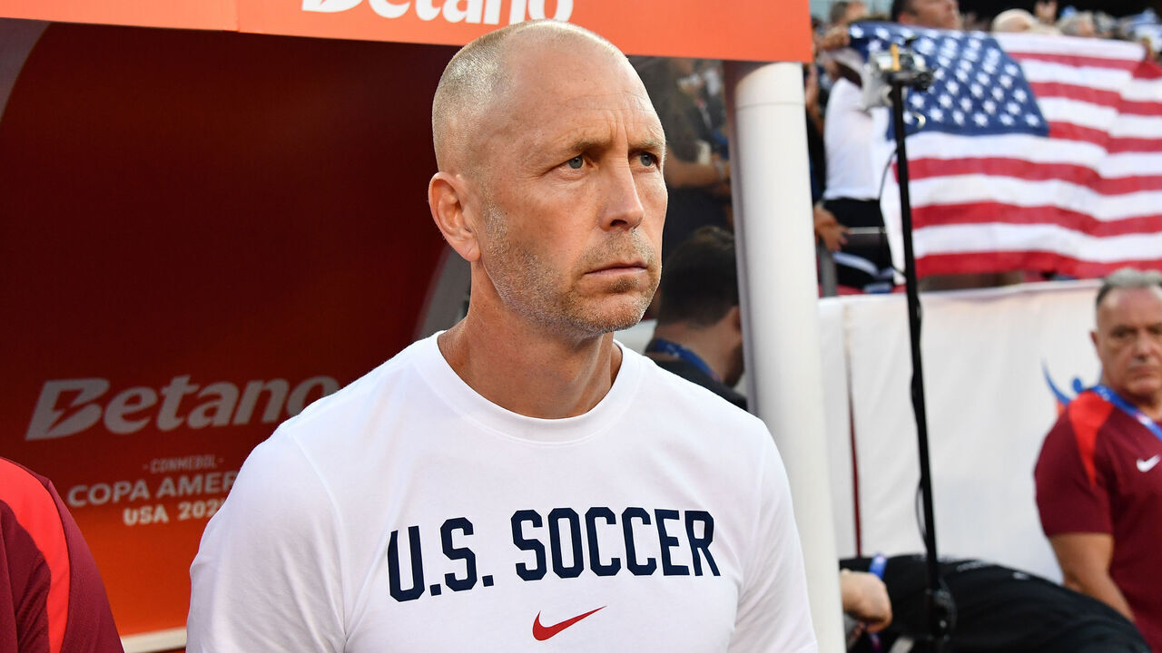 KANSAS CITY, MISSOURI - JULY 1: Gregg Berhalter Head Coach of the United States during the National Anthem before the CONMEBOL Copa America group C match between the United States and Uruguay at GEHA Field at Arrowhead Stadium on July 1, 2024 in Kansas City, Missouri.