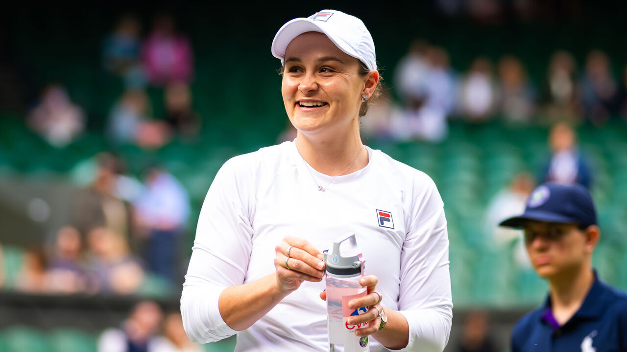 LONDON, ENGLAND - JULY 10: Ashleigh Barty of Australia playing Invitational Doubles with partner Casey Dellacqua of Australia against Andrea Petkovic of Germany and Magdalena Rybarikova of Slovakia on Day Ten of The Championships Wimbledon 2024 at All England Lawn Tennis and Croquet Club on July 10, 2024 in London, England