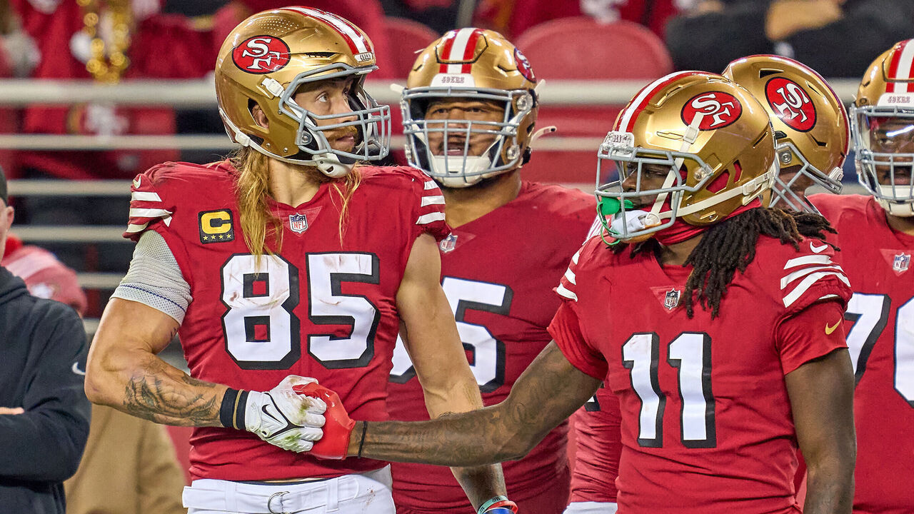 SANTA CLARA, CALIFORNIA - DECEMBER 25: George Kittle #85 and Brandon Aiyuk #11 of the San Francisco 49ers shake hands in action during a game between the San Francisco 49ers and the Baltimore Ravens at Levi's Stadium on December 25, 2023 in Santa Clara, California.