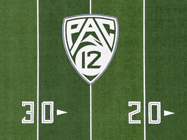 EUGENE, OREGON - MAY 23: The Pac-12 Conference logo on the Autzen Stadium football field on the campus of the University of Oregon on May 23, 2024 in Eugene, Oregon
