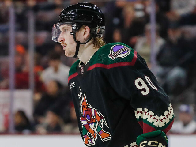 TEMPE, AZ - NOVEMBER 28: Arizona Coyotes defenseman J.J. Moser (90) looks on during the NHL hockey game between the Tampa Bay Lightning and the Arizona Coyotes on November 28, 2023 at Mullet Arena in Tempe, Arizona.