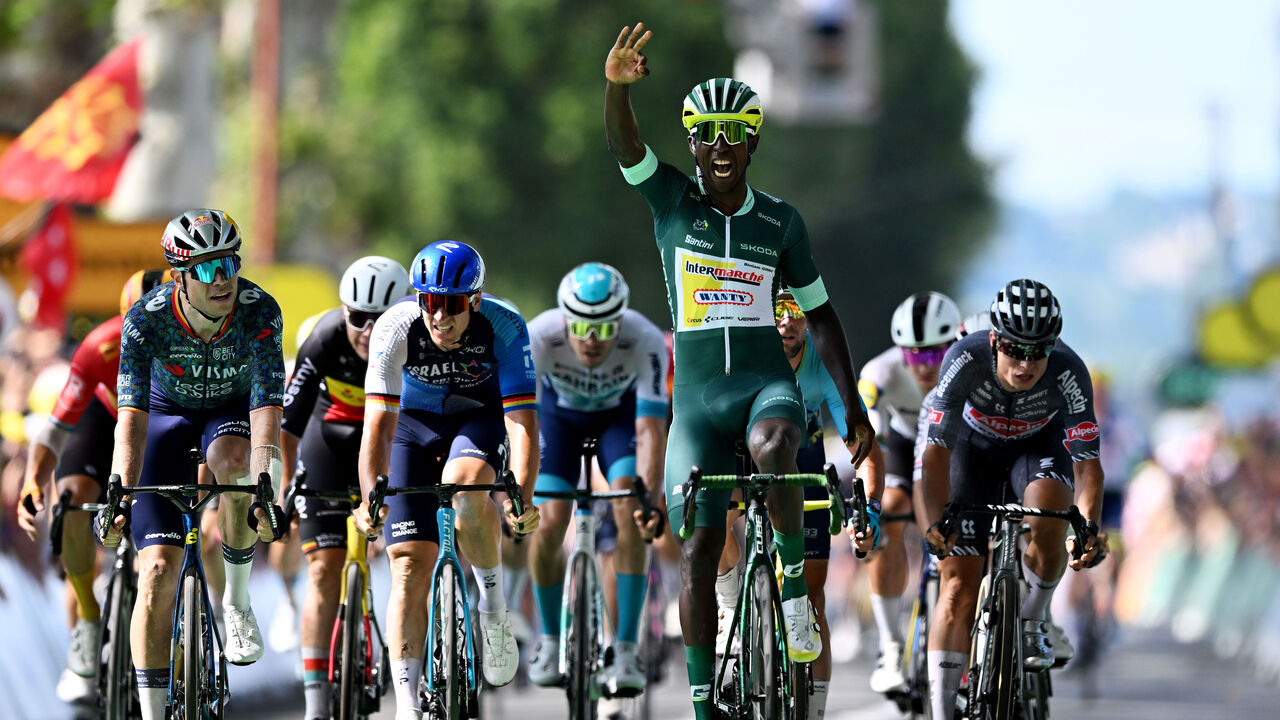VILLENEUVE-SUR-LOT, FRANCE - JULY 11: Biniam Girmay of Eritrea and Team Intermarche - Wanty - Green Sprint Jersey celebrates at finish line as stage winner ahead of (L-R) Wout Van Aert of Belgium and Team Visma | Lease a Bike, Pascal Ackermann of Germany and Team Israel - Premier Tech and Jasper Philipsen of Belgium and Team Alpecin - Deceuninck during the 111th Tour de France 2024, Stage 12 a 203.6km stage from Aurillac to Villeneuve-sur-Lot / #UCIWT / on July 11, 2024 in Villeneuve-sur-Lot, France.