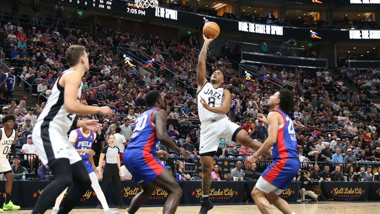 SALT LAKE CITY, UT - JULY 10: Brice Sensabaugh #8 of the Utah Jazz shoots over Adem Bona #30 and Jared McCain #20 of the Philadelphia 76ers during the second half of their NBA Summer League game at the Delta Center on July 10, 2024 in Salt Lake City, Utah. NOTE TO USER: User expressly acknowledges and agrees that, by downloading and or using this photographer, user is consenting to the terms and conditions of Getty Images License Agreement.