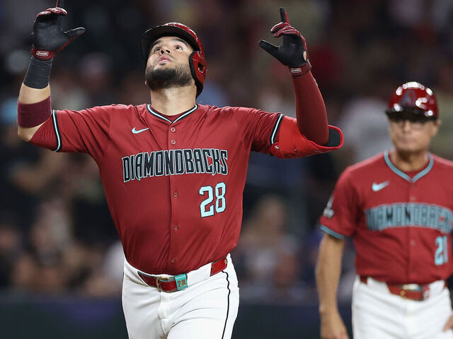 Report: D-Backs exercise Suárez's $15M option | theScore.com