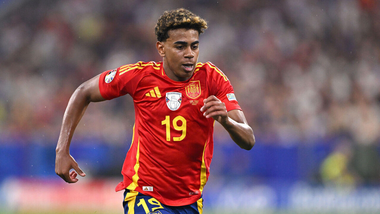 MUNICH, GERMANY - JULY 09: Lamine Yamal of Spain in action during the UEFA EURO 2024 Semi-Final match between Spain and France at Munich Football Arena on July 09, 2024 in Munich, Germany.