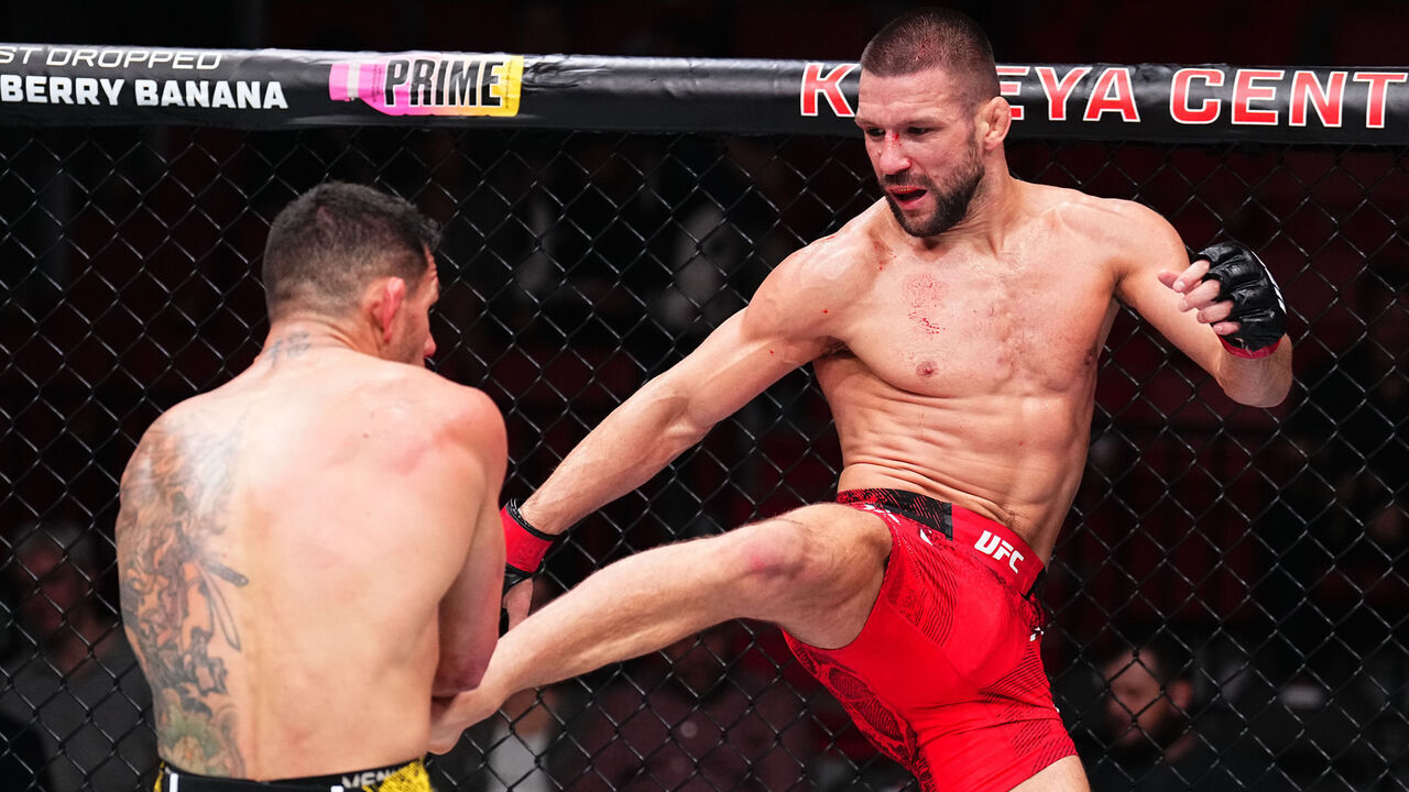 MIAMI, FLORIDA - MARCH 09: (R-L) Mateusz Gamrot of Poland kicks Rafael Dos Anjos of Brazil in a lightweight fight during the UFC 299 event at Kaseya Center on March 09, 2024 in Miami, Florida.