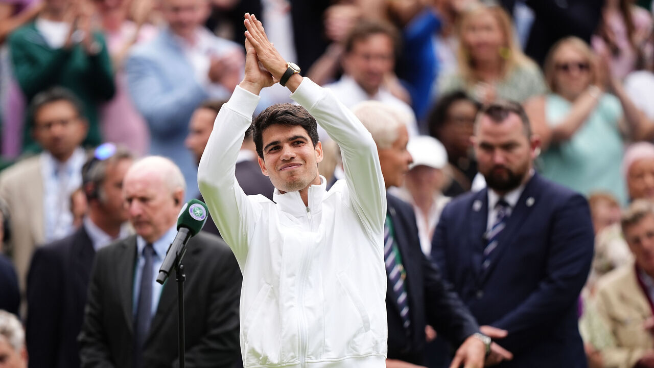 Carlos Alcaraz celebrates his victory over Daniil Medvedev (not pictured) on day twelve of the 2024 Wimbledon Championships at the All England Lawn Tennis and Croquet Club, London. Picture date: Friday July 12, 2024.