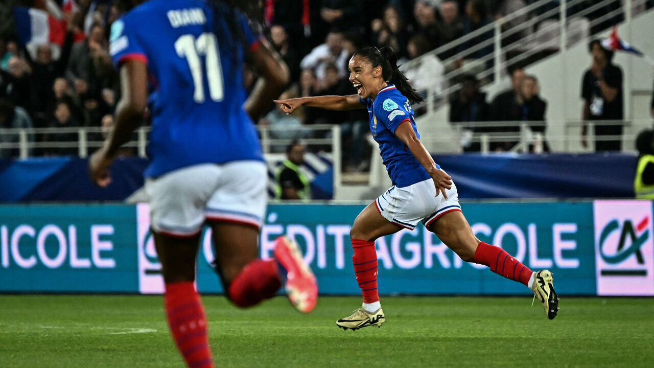 France's defender Sakina Karchaoui #07 (R) celebrates after scoring her team's opening goal during the UEFA women's Euro 2025 qualifying football match between France and Sweden at Gaston Gerard stadium, in Dijon, central eastern France, on July 12, 2024.