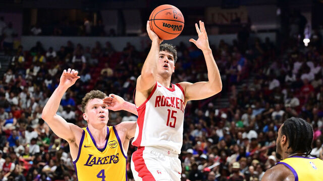 LAS VEGAS, NV - JULY 12: Reed Sheppard #15 of the Houston Rockets shoots the ball during the game against the Los Angeles Lakers on July 12, 2024 at the Thomas & Mack Center in Las Vegas, Nevada. Mandatory Copyright Notice: Copyright 2024 NBAE