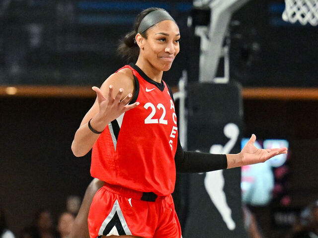 COLLEGE PARK, GA JULY 12: Las Vegas center A'ja Wilson (22) reacts after a three-pointer during the WNBA game between the Las Vegas Aces and the Atlanta Dream on July 12th, 2024 at the Gateway Arena in College Park, GA.