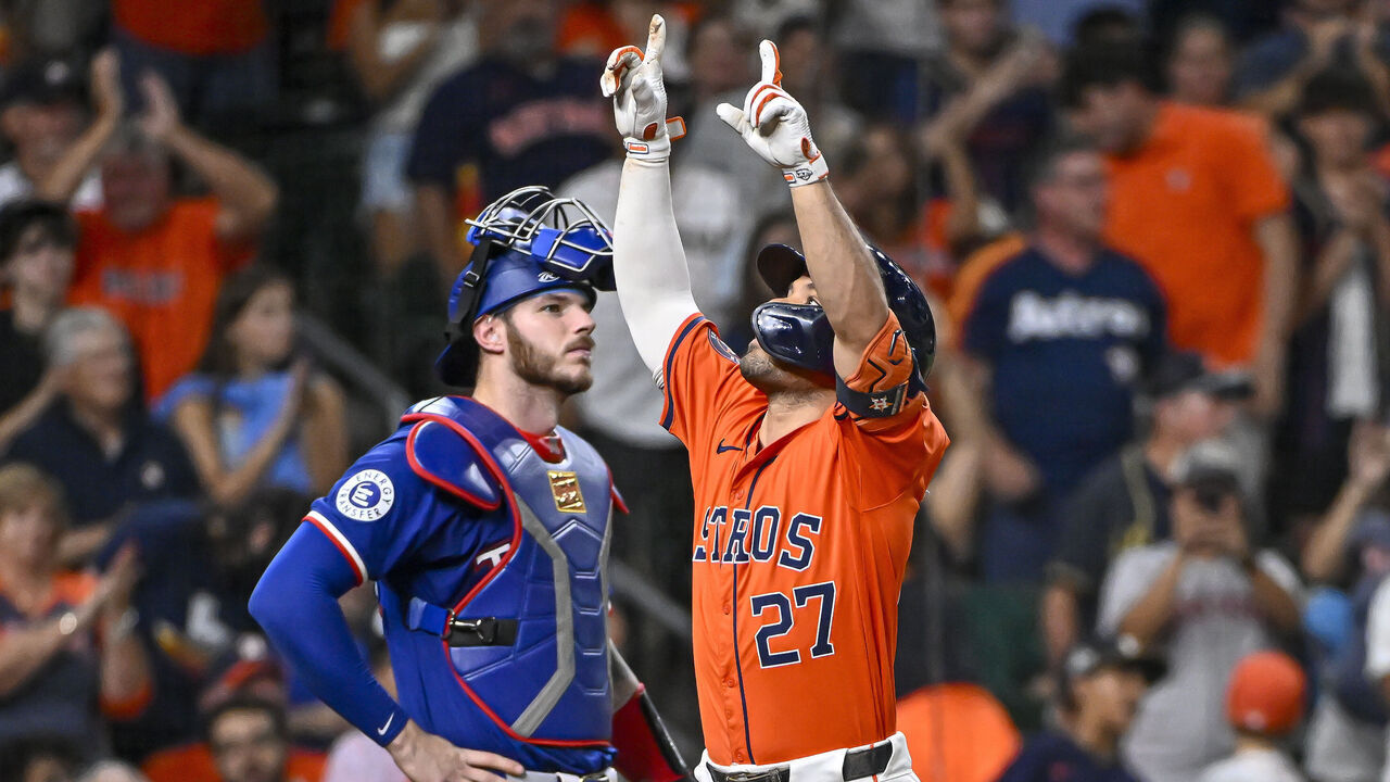 HOUSTON, TEXAS - JULY 12: Jose Altuve #27 of the Houston Astros celebrates after hitting a three-run home run in the sixth inning against the Texas Rangers at Minute Maid Park on July 12, 2024 in Houston, Texas.