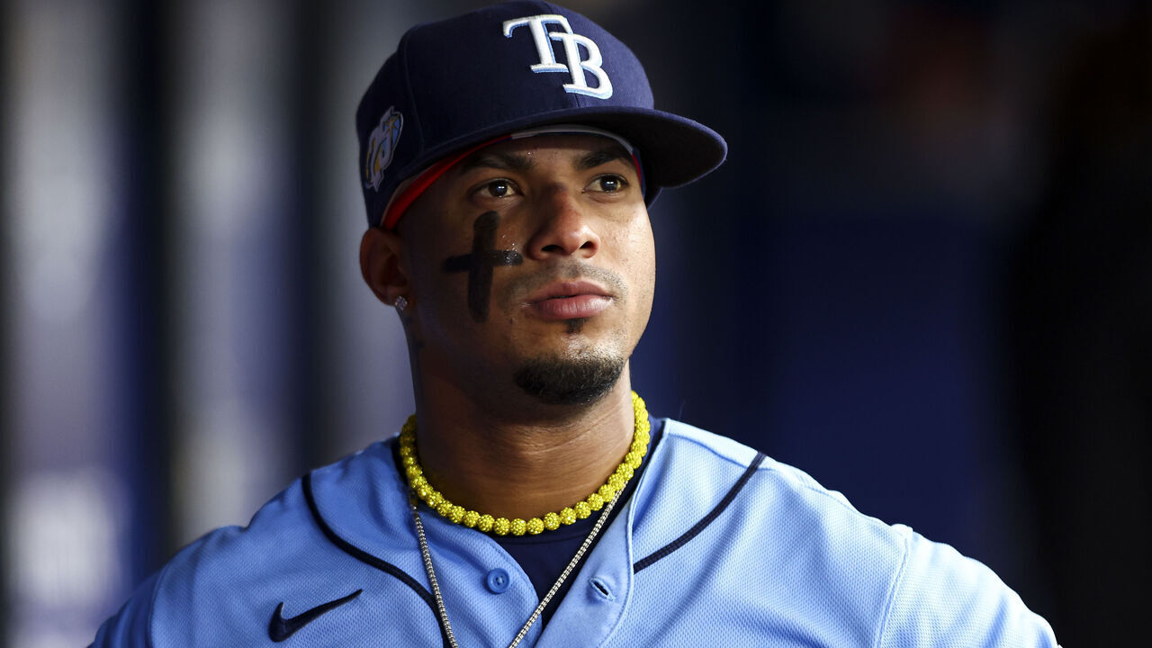 ST PETERSBURG, FLORIDA - APRIL 08: Wander Franco #5 of the Tampa Bay Rays looks on from the dugout during the third inning against the Oakland Athletics at Tropicana Field on April 08, 2023 in St Petersburg, Florida.