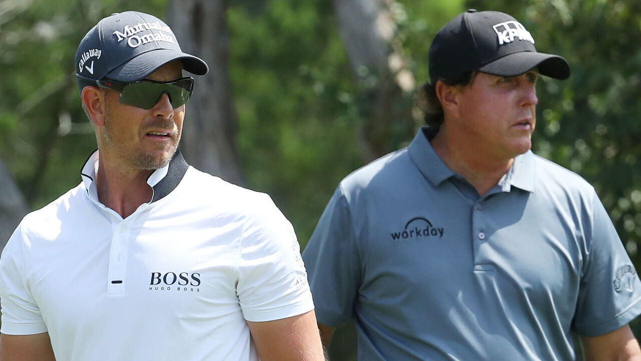 AUSTIN, TEXAS - MARCH 27: Henrik Stenson of Sweden and Phil Mickelson of the United States look on from the second tee during the first round of the World Golf Championships-Dell Technologies Match Play at Austin Country Club on March 27, 2019 in Austin, Texas.