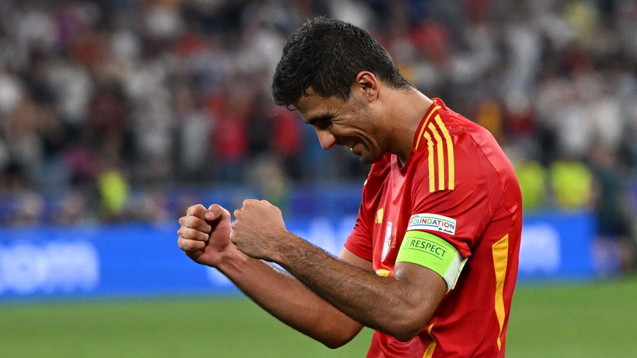 MUNICH, GERMANY - JULY 09: Rodri Hernandez of Spain celebrates after the victory in the UEFA Euro 2024 semi-final football match between Spain and France at the Munich Football Arena in Munich on July 9, 2024.