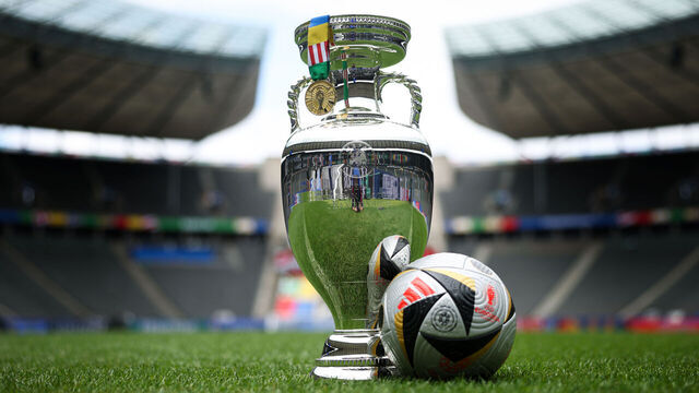 BERLIN, GERMANY - JULY 13: A view of the UEFA EURO trophy, winners medal and match ball ahead of the UEFA EURO 2024 Final between Spain and England at Olympiastadion Berlin on July 13, 2024 in Berlin, Germany.