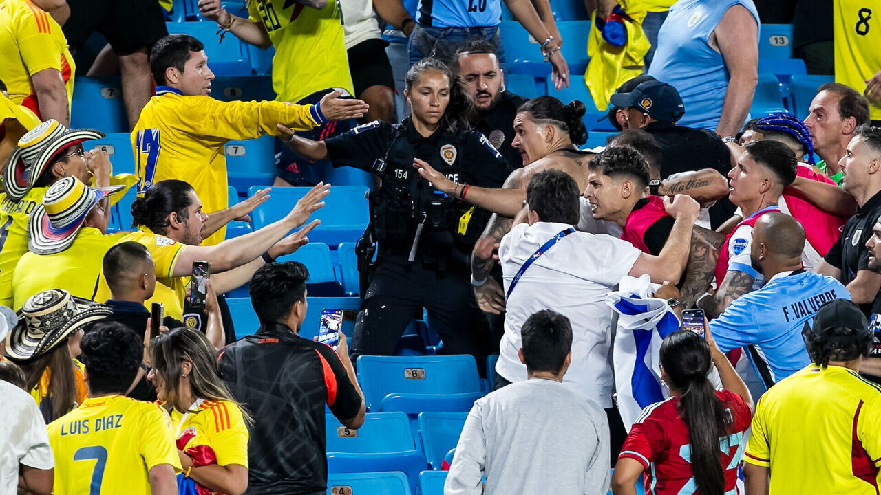 CHARLOTTE, NC - JULY 10: Uruguay forward Darwin Núñez (19) engages with hostile fans in the stands after the CONMEBOL Copa America semifinal between Uruguay and Colombia on Wednesday July 10, 2024 at Bank of America Stadium in Charlotte, NC.