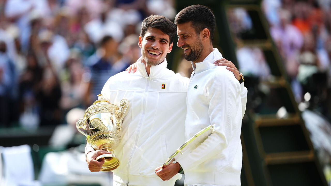 Carlos Alcaraz (left) with Novak Djokovic after the Gentlemen's Singles Final on day fourteen of the 2024 Wimbledon Championships at the All England Lawn Tennis and Croquet Club, London. Picture date: Sunday July 14, 2024.