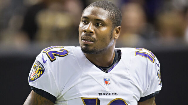 NEW ORLEANS, LA - NOVEMBER 24: Jacoby Jones #12 of the Baltimore Ravens warms up before a game against the New Orleans Saints at Mercedes-Benz Superdome on November 24, 2014 in New Orleans, Louisiana. The Ravens defeated the Saints 34-27.