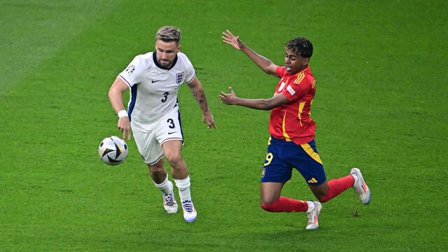 Spain's forward #19 Lamine Yamal reacts after a challenge by England's defender #03 Luke Shaw during the UEFA Euro 2024 final football match between Spain and England at the Olympiastadion in Berlin on July 14, 2024.