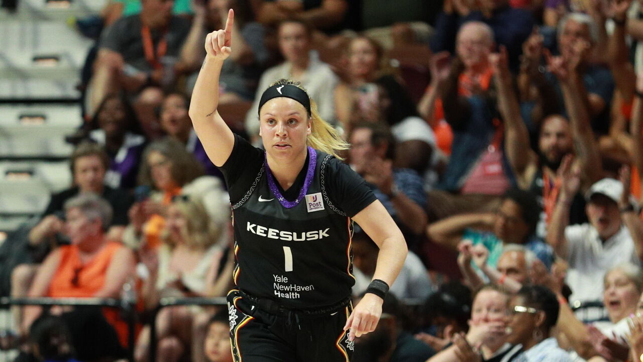 UNCASVILLE, CT - JULY 14: Rachel Banham #1 of the Connecticut Sun celebrates a three point basket during the game against the Phoenix Mercury on July 14, 2024 at the Mohegan Sun Arena in Uncasville, Connecticut. Mandatory Copyright Notice: Copyright 2024 NBAE