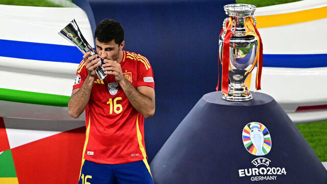 Spain's midfielder #16 Rodri celebrates winning the player of the tournament award after the UEFA Euro 2024 final football match between Spain and England at the Olympiastadion in Berlin on July 14, 2024.