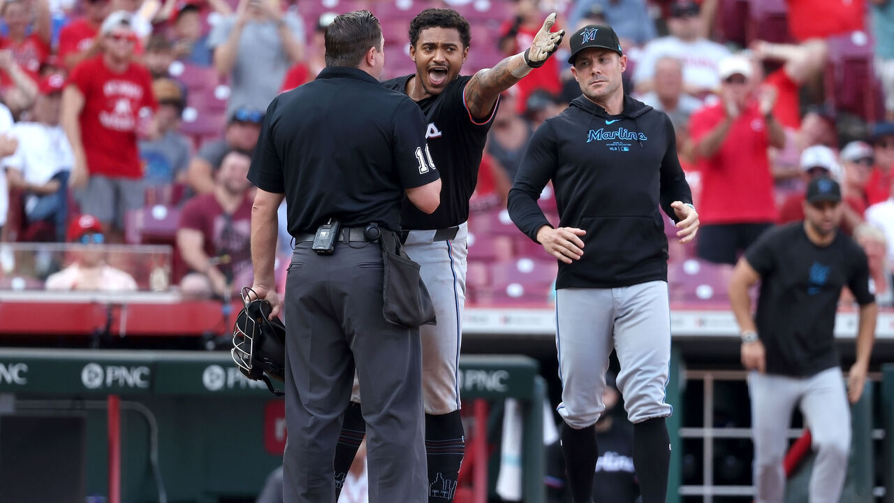 CINCINNATI, OHIO - JULY 13: Dane Myers #54 of the Miami Marlins argues with home plate umpire Derek Thomas #106 after being thrown out of the game during the eighth inning of the game against the Cincinnati Reds at Great American Ball Park on July 13, 2024 in Cincinnati, Ohio. Cincinnati defeated Miami 10-6.
