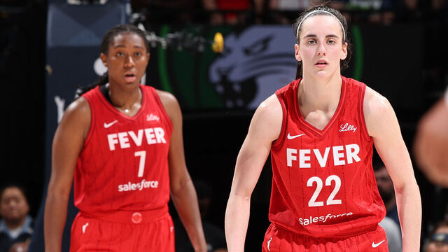 MINNEAPOLIS, MN - JULY 14: Aliyah Boston #7 and Caitlin Clark #22 of the Indiana Fever look on during the game against the Minnesota Lynx on July 14, 2024 at Target Center in Minneapolis, Minnesota. Mandatory Copyright Notice: Copyright 2024 NBAE