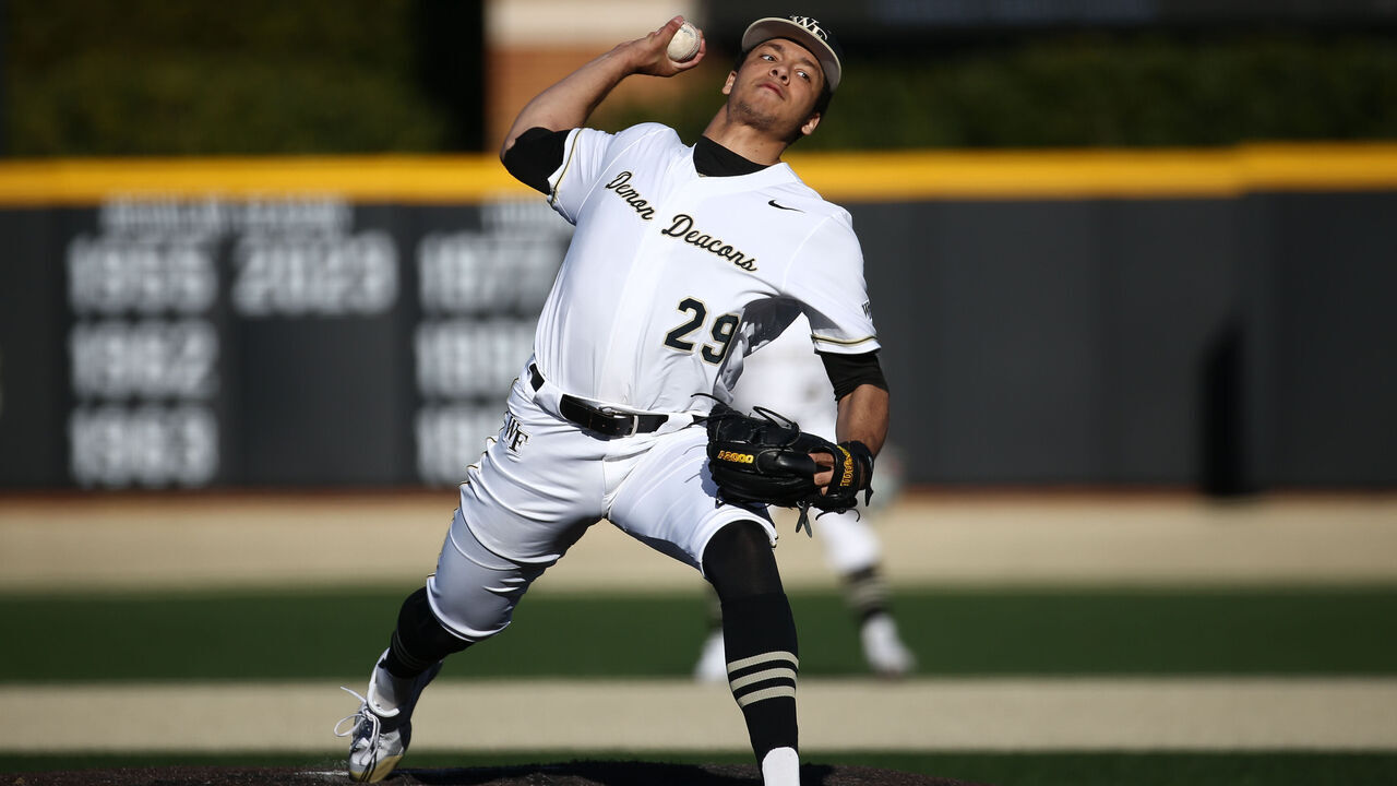 WINSTON SALEM, NORTH CAROLINA - MARCH 2: Chase Burns #29 of Wake Forest Demon Deacons makes a pitch against the Binghamton Bearcats during the second game of the doubleheader at David F. Couch Ballpark on March 2, 2024 in Winston Salem, North Carolina.