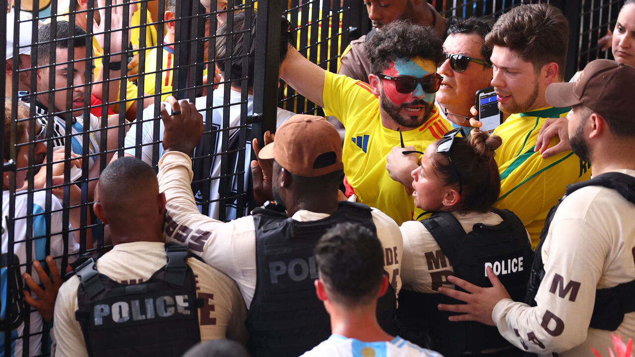 MIAMI GARDENS, FLORIDA - JULY 14: Fans try to enter the stadium amid disturbances prior to the CONMEBOL Copa America 2024 Final match between Argentina and Colombia at Hard Rock Stadium on July 14, 2024 in Miami Gardens, Florida.