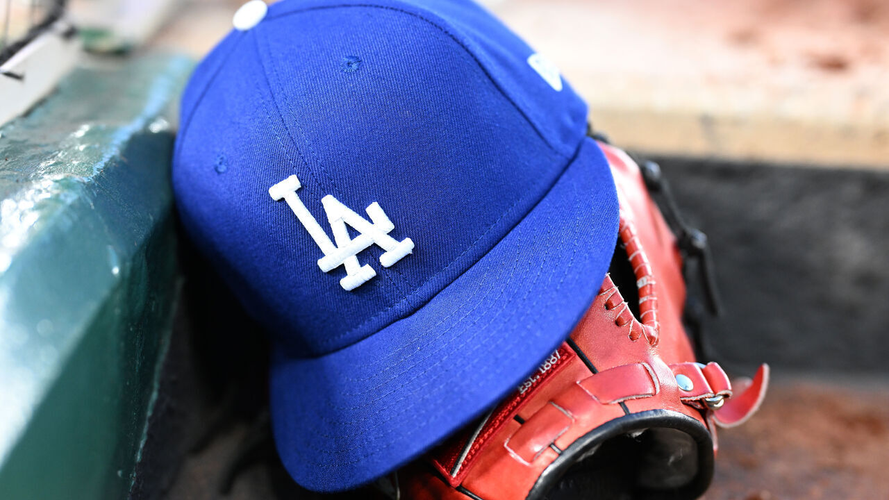 WASHINGTON, DC - APRIL 24: A view of a Los Angeles Dodgers baseball cap in the dugout during the game against the Washington Nationals at Nationals Park on April 24, 2024 in Washington, DC.