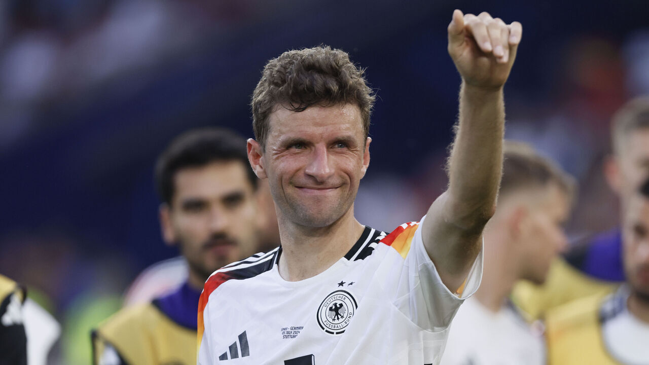 STUTTGART, GERMANY - JULY 5: Thomas Muller of Germany waves at fans after the UEFA EURO 2024 quarter-final match between Spain and Germany at Stuttgart Arena on July 5, 2024 in Stuttgart, Germany.