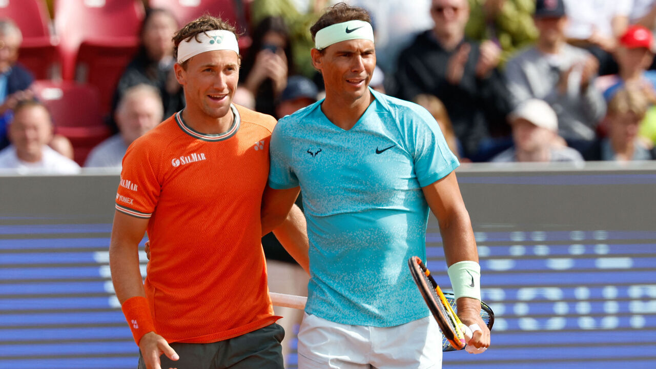 Spain's Rafael Nadal (R) and Norway's Casper Ruud react after winning the men's doubles tennis match against Argentina's Guido Andreozzi and Mexico's Miguel Reyes-Varela during the Nordea Open ATP tennis tournament in Bastad, Sweden, on July 15, 2024. Rafael Nadal teams up with Casper Ruud in the doubles at the ATP Bastad Open, Sweden, where he is also playing singles as part of his preparations for the Paris Olympics.