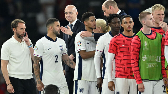 (From L) England's head coach Gareth Southgate, England's defender #02 Kyle Walker, England's midfielder #10 Jude Bellingham, England's midfielder #26 Kobbie Mainoo, England's defender #08 Trent Alexander-Arnold and England's midfielder #25 Adam Wharton greet Britain's Prince William, Prince of Wales (C) after the UEFA Euro 2024 final football match between Spain and England at the Olympiastadion in Berlin on July 14, 2024.
