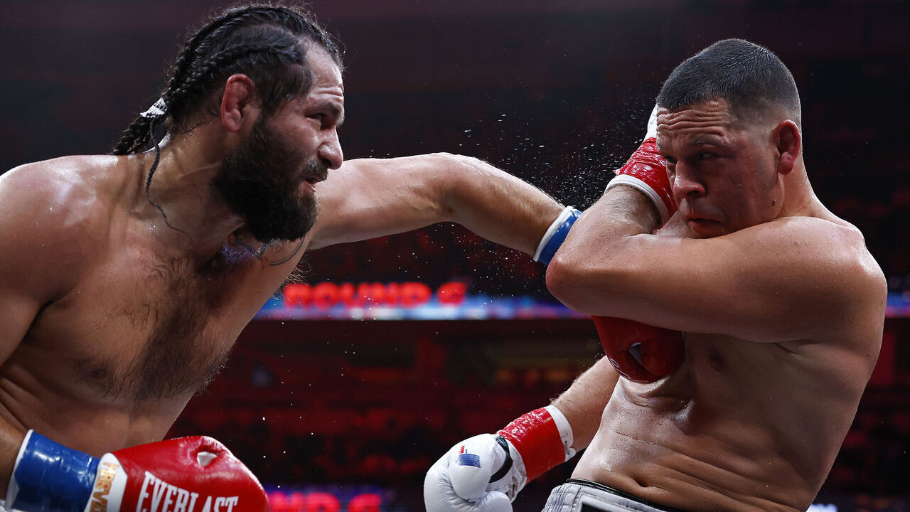 ANAHEIM, CALIFORNIA - JULY 06: (L-R) Jorge Masvidal and Nate Diaz during round of their cruiserweights fight at Honda Center on July 06, 2024 in Anaheim, California.