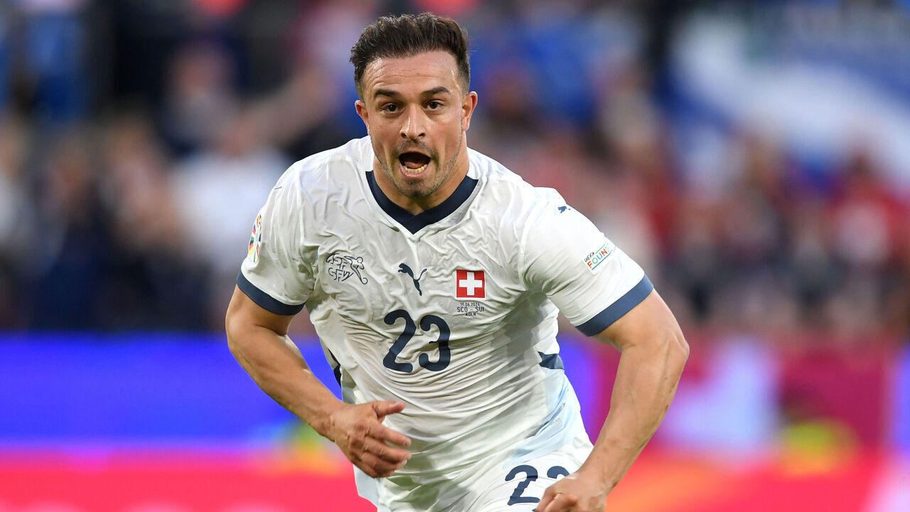 COLOGNE, GERMANY - JUNE 19: Xherdan Shaqiri of Switzerland celebrates scoring his team's first goal during the UEFA EURO 2024 group stage match between Scotland and Switzerland at Cologne Stadium on June 19, 2024 in Cologne, Germany.