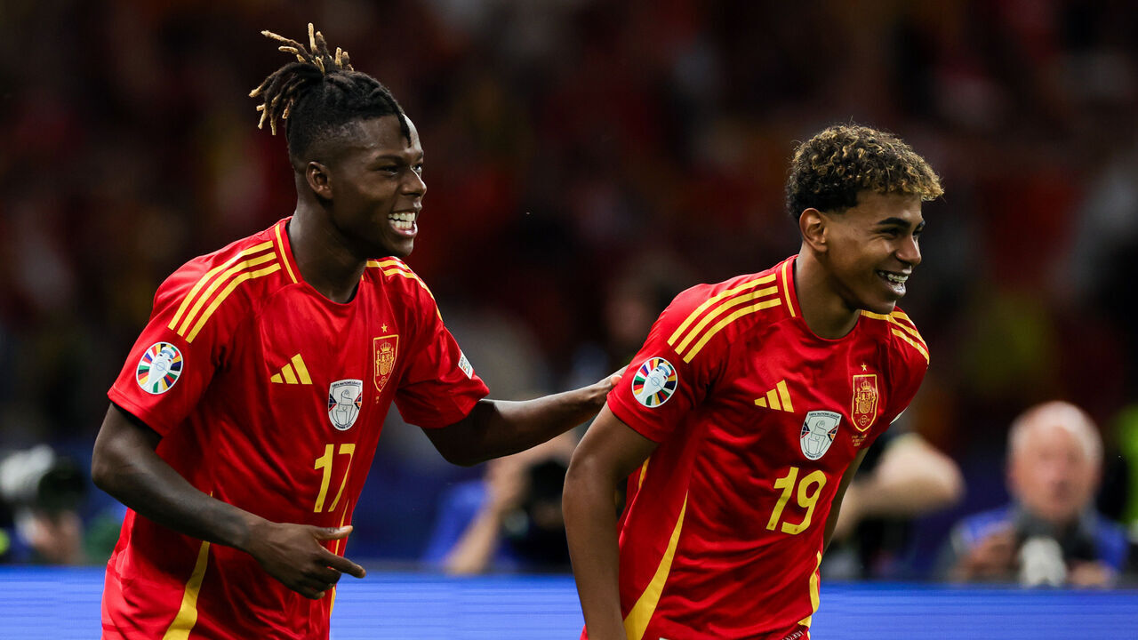 BERLIN, GERMANY - JULY 14: Nicholas Williams Arthuer #17 of Spain celebrates his goal with Lamine Yamal Nasraoui Ebana #19 of Spain during the UEFA EURO 2024 final match between Spain and England at Olympiastadion on July 14, 2024 in Berlin, Germany.