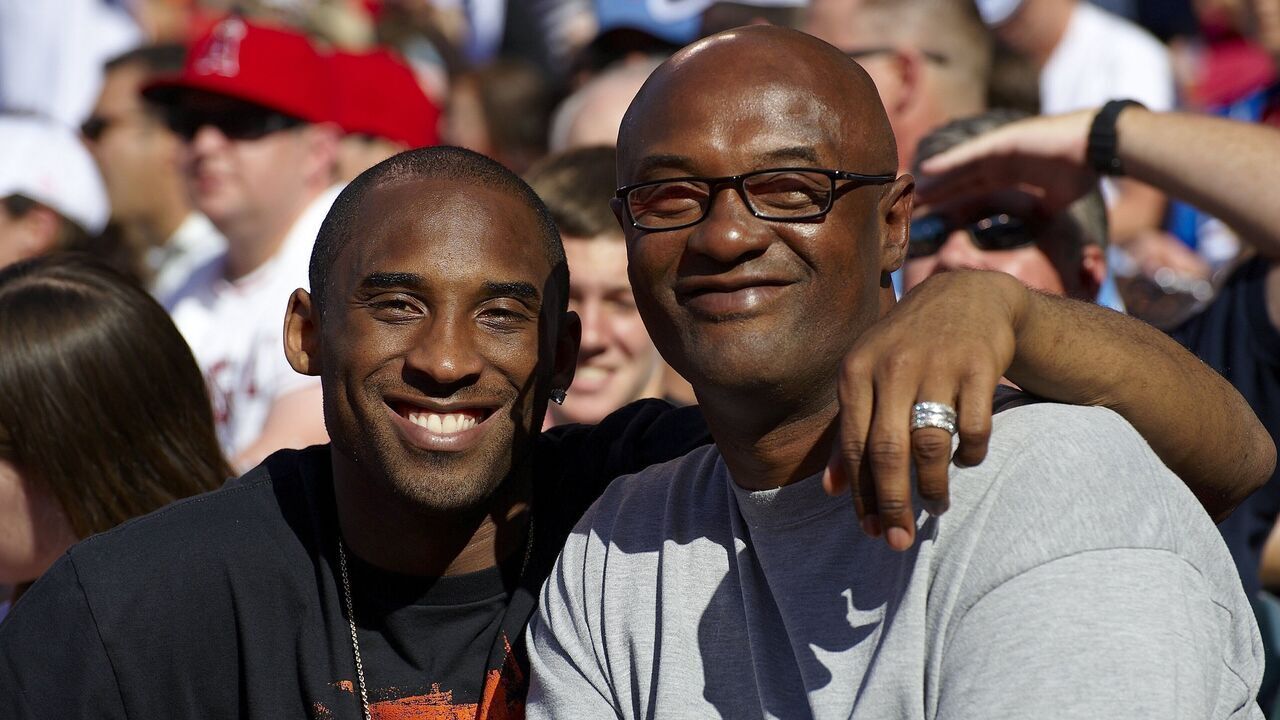 Baseball: Closeup of Los Angeles Lakers basketball player Kobe Bryant with his father Joe Bryant during Los Angeles Angels of Anaheim vs Los Angeles Dodgers game. Anaheim, CA 6/21/2009 CREDIT: John W. McDonough