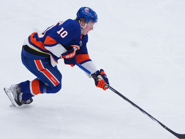 ELMONT, NY - APRIL 11: New York Islanders Right Wing Simon Holmstrom (10) skates with the puck during the second period of the National Hockey League game between the Montreal Canadiens and the New York Islanders on April 11, 2024, at UBS Arena in Elmont, NY.